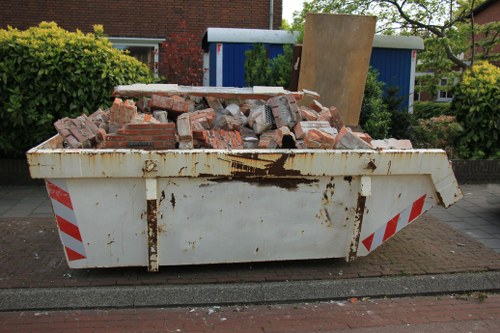 Professionals clearing furniture in a Highbury home